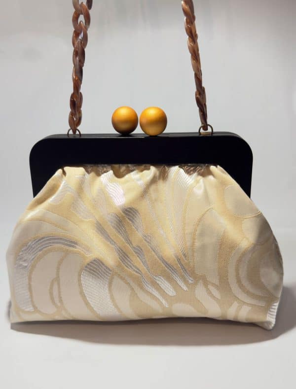 bolsos hechos a mano sula and frida boquailla de madera Leon